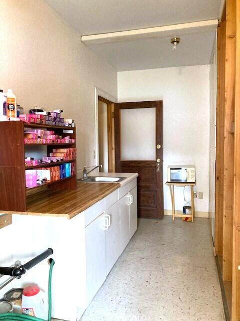 
                        Property photograph at
                        380 E 3RD AVE
                      